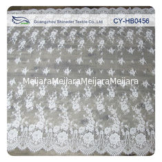 Китай Напечатанная таможня ткани шнурка Chantilly Embroideried нейлона цвета слоновой кости флористическая поставщик